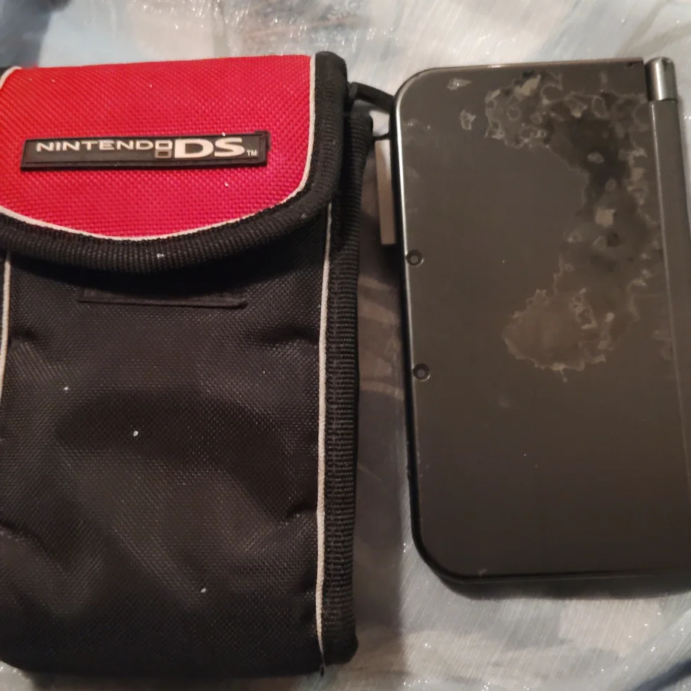 Nintendo DS with Red and Black Case